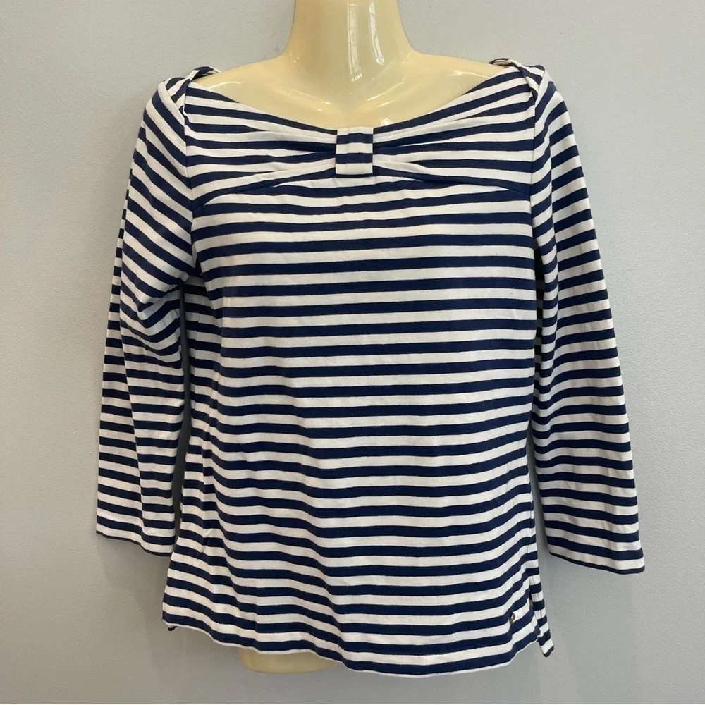 Kate Spade Wheaton Top of Mandy Bax­ter (Mol­ly Ephraim) in Last Man Stand­ing
